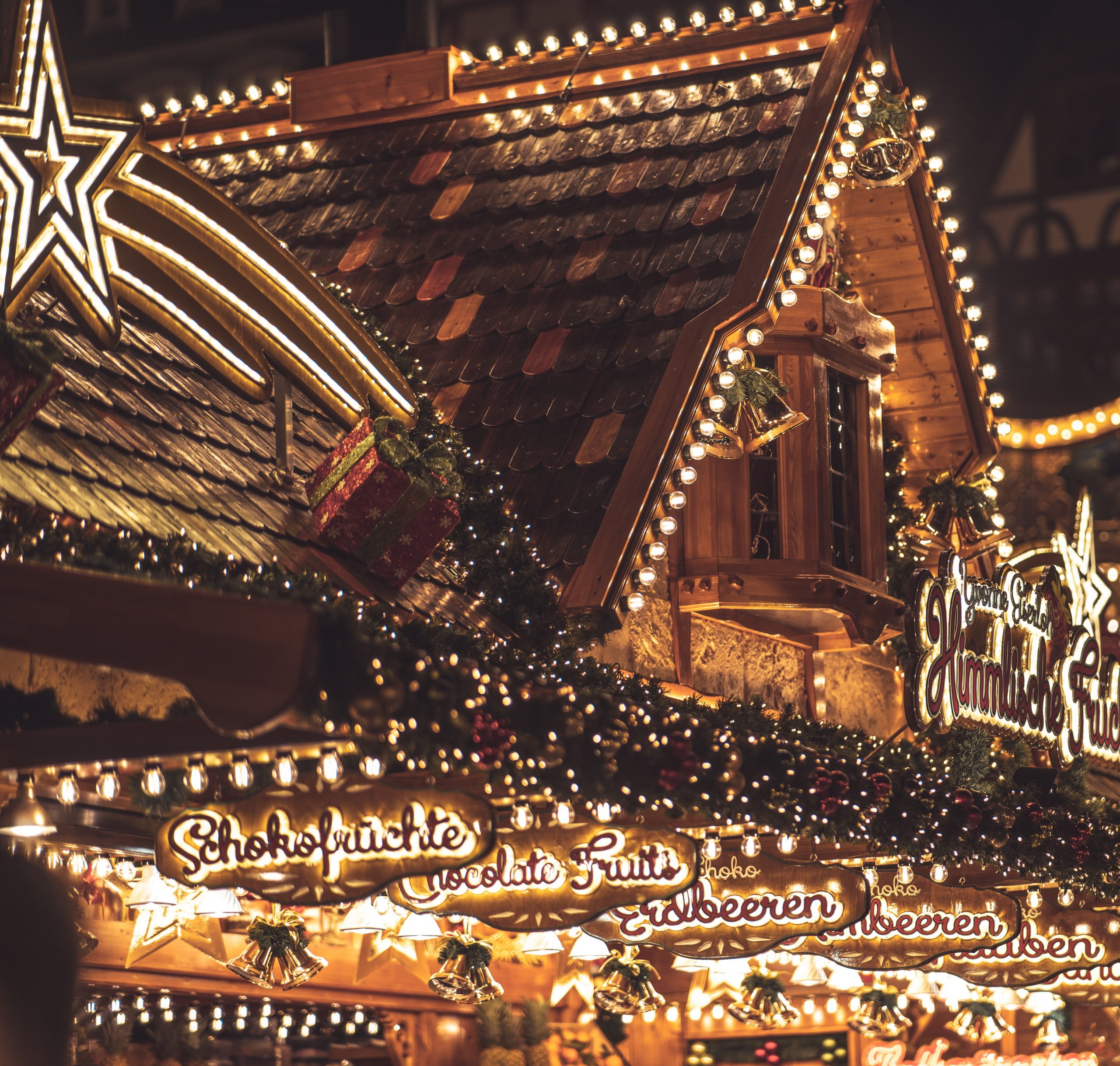 hut with lots of light on a christmas market