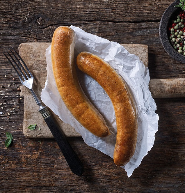 Various german sausages on a gas bbq