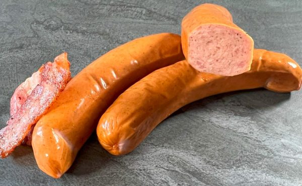 raw Bacon Frankfurters on a slate board