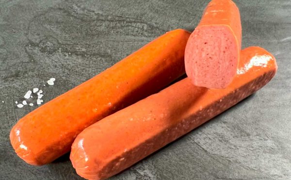 Raw Vienna Beef Frankfurters on a slate board